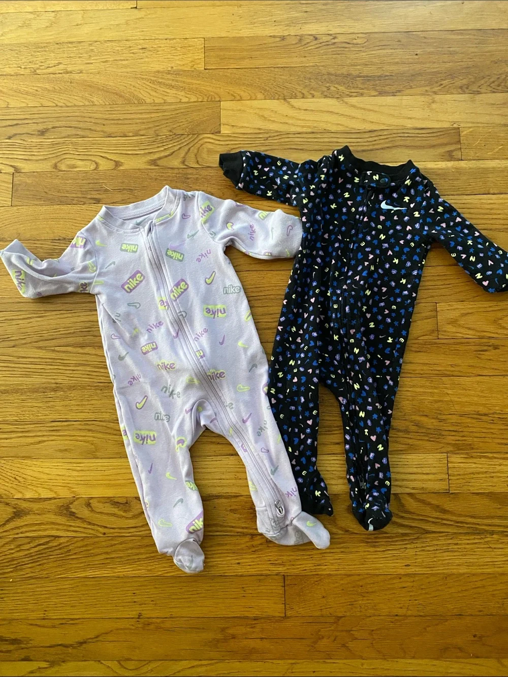 Nike Kids Footed One-Piece Pajamas in Lavender and Black